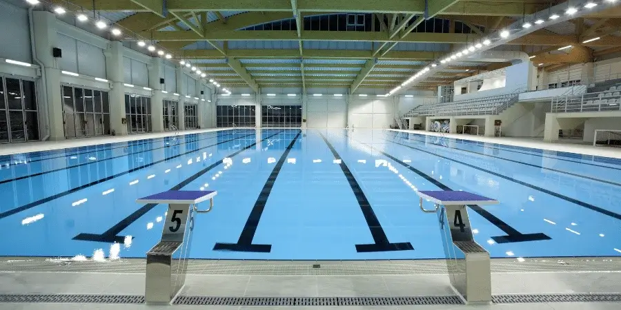 Olympic swimming pool, demonstrating the length of 2/3 of a pool as 100 feet.