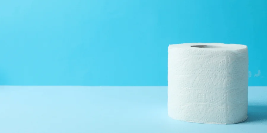 A roll of toilet paper on a blue background.