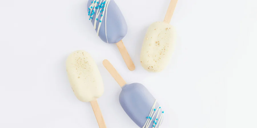 Two popsicle sticks, each 2 inches long, placed next to each other.