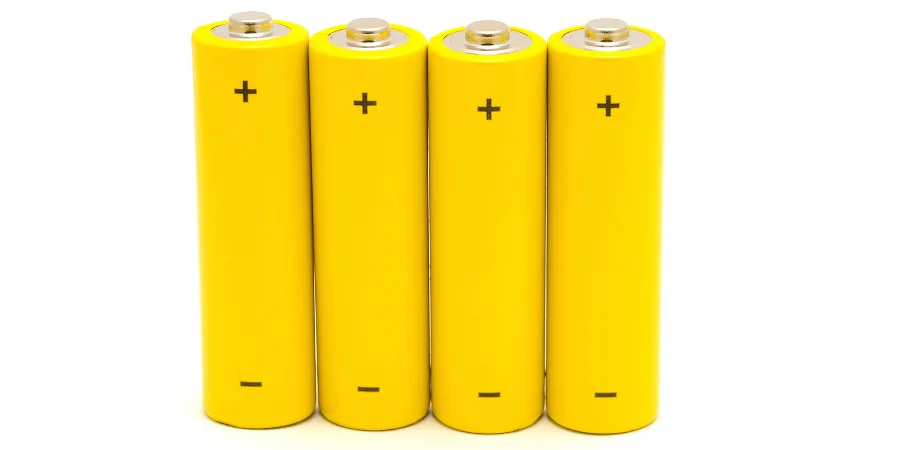 Four AA batteries stacked side by side, each close to 2 inches in length.