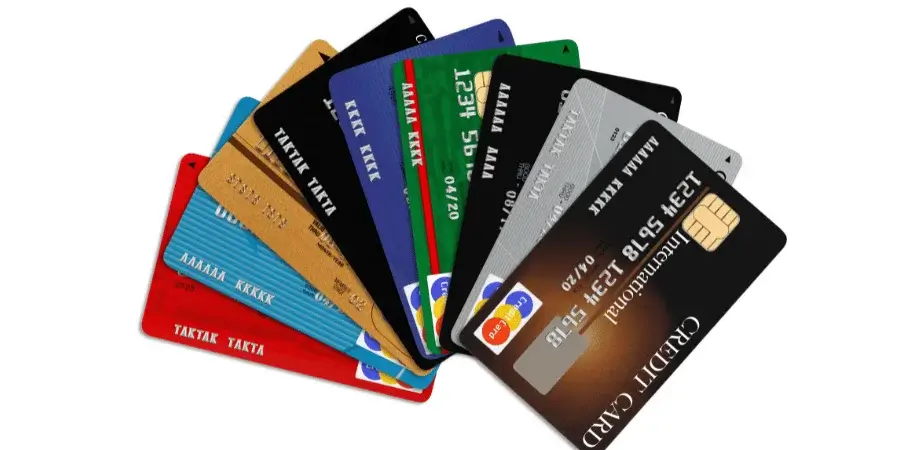 A set of five credit cards stacked, totaling approximately 16 inches in length.