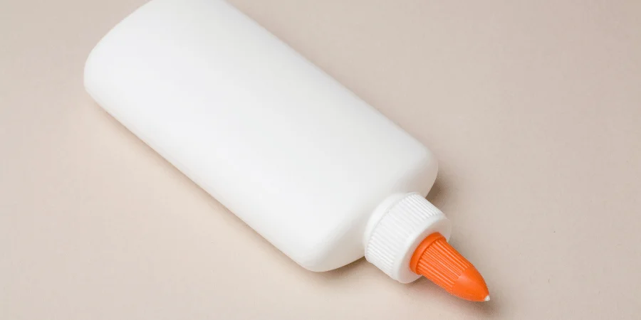 A bottle of white all-purpose glue weighing 100 grams.