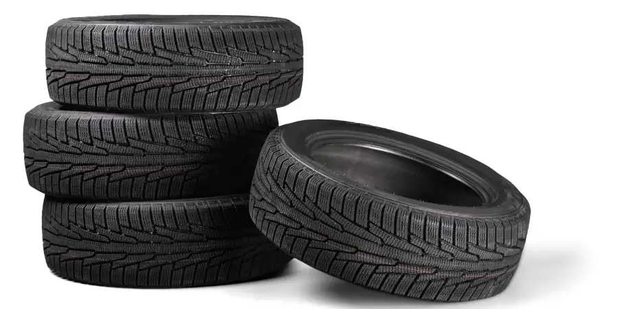A stack of four car tires, each weighing about 30kg.