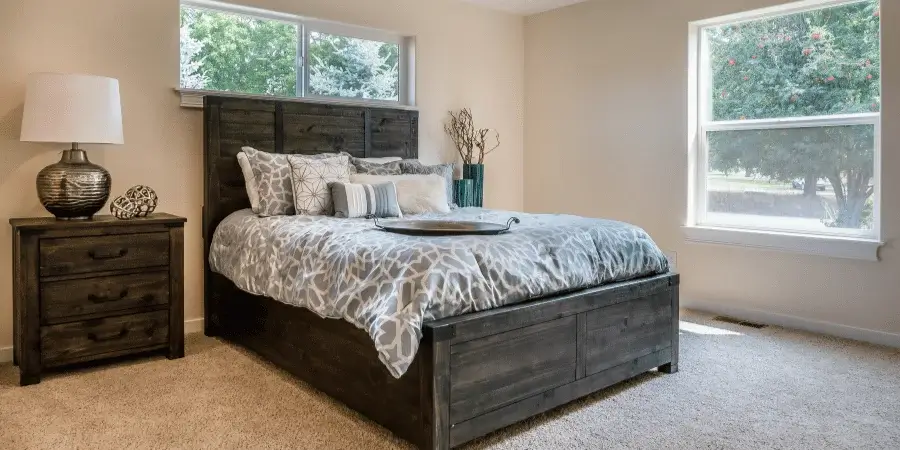 A queen-size bed with a box spring, weighing around 30kg.