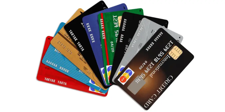 Collection of various credit cards in different colors and designs, stacked together to showcase the diversity of cards.