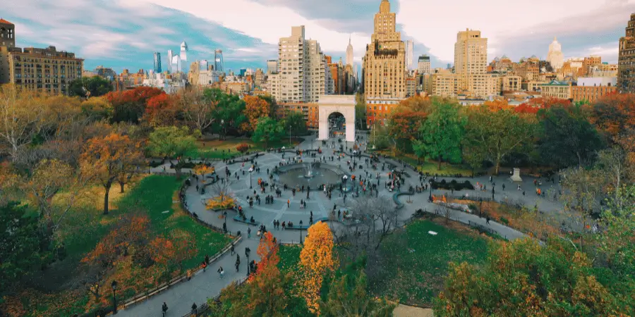 Central Park Zoo in New York City with green space and trees, perfect for a relaxing day.