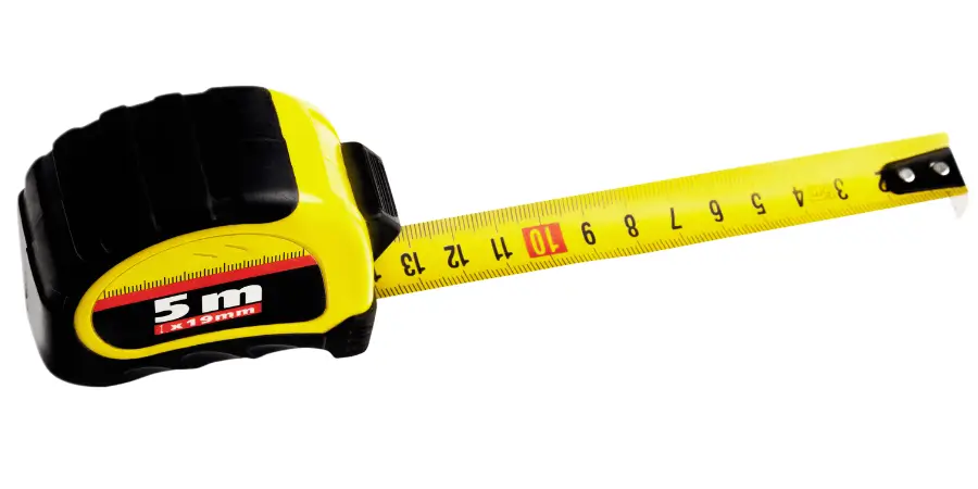 Close-up of a yellow 5-meter tape measure with black detailing on a white background.
